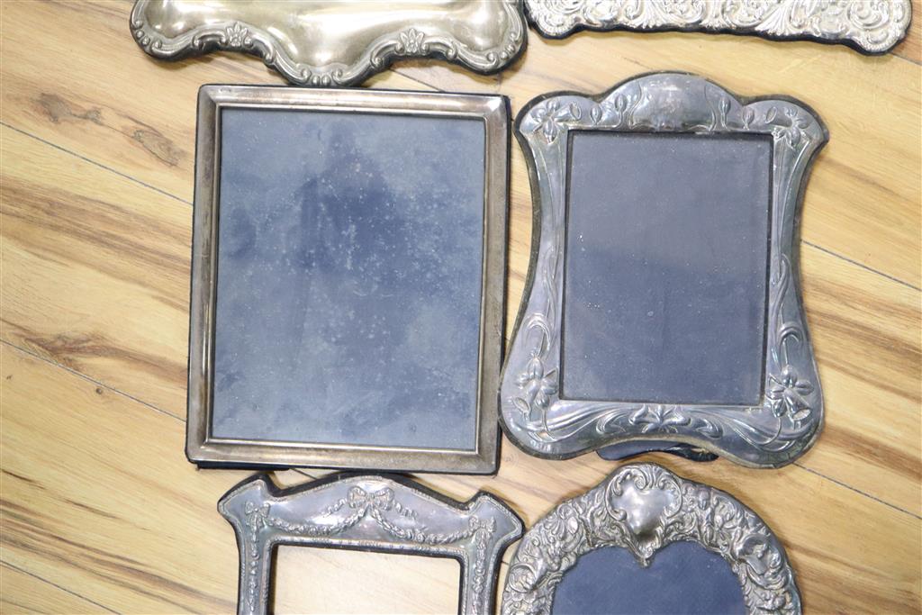 Six assorted large modern silver mounted photograph frames, largest 39cm.